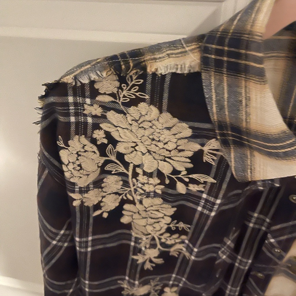 Beautiful embroidery on this Savanna Jane blouse.